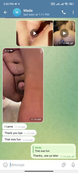 Close-up of a person's lower body and genital area during an explicit sexual act, shown in a messaging app interface.