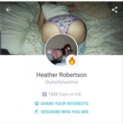 A woman with a curvy build lies on a bed wearing patterned underwear, viewed from behind.