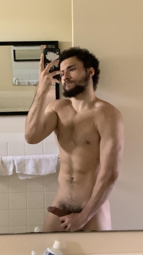 fit guy squeezes hard cock